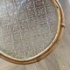 Sellette wears rattan plants