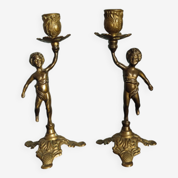 Set of two cherub cherub candlesticks