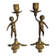 Set of two cherub cherub candlesticks