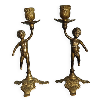 Set of two cherub cherub candlesticks