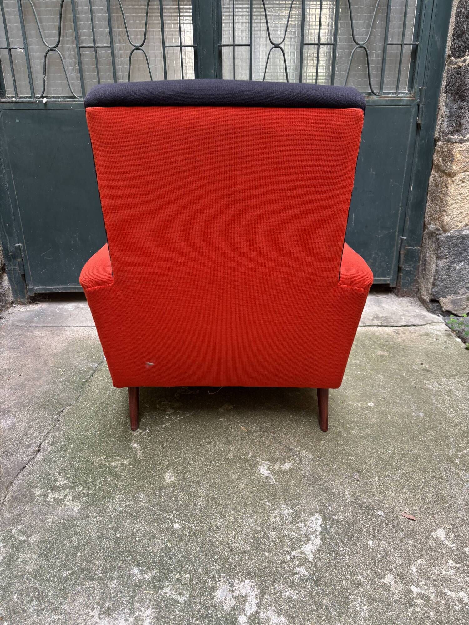 Pair of vintage black and red armchairs from the 1960s.