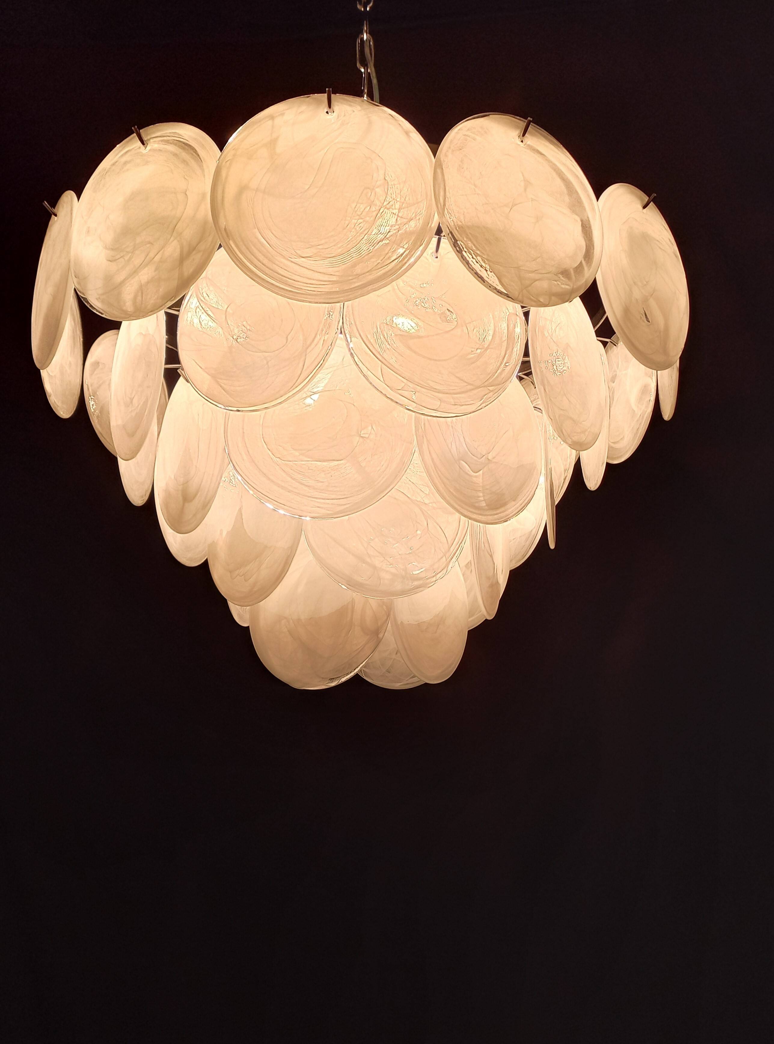 Handcrafted chandelier with Murano glass and handmade alabaster discs.