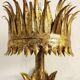 Wrought iron and gold leaf wall light. Spain, 1950s.
