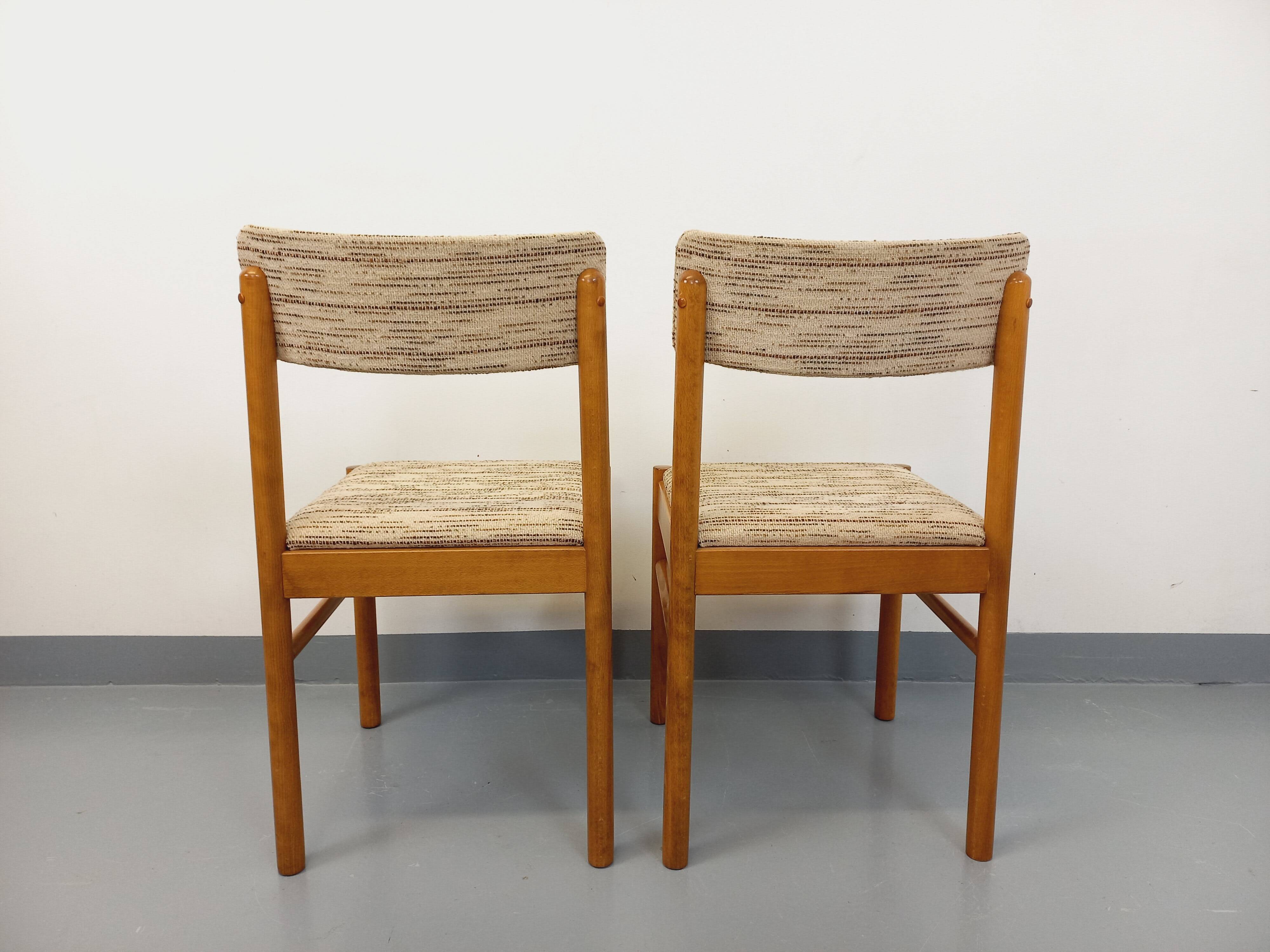 Pair of vintage Baumann chairs in wood and fabric from the 70s