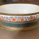 Porcelain planter with Japanese decoration, gilded brass base and rim, 20th century