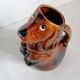 Zoomorphic dachshund dog pitcher in majolica slip