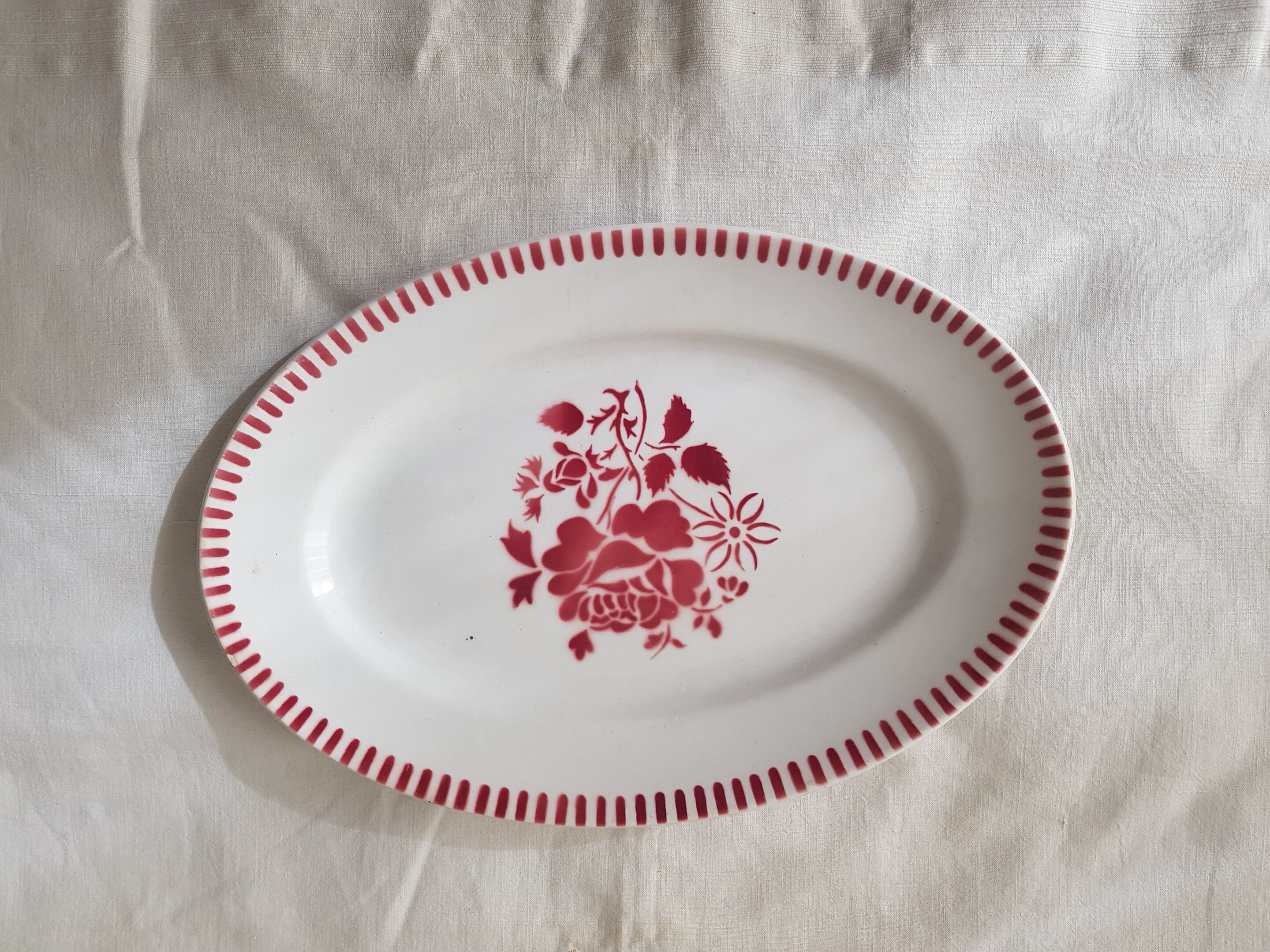 Old oval dish in luneville earthenware model evian floral decoration