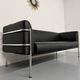 Three-seater tubular chrome and black leather sofa by Kébé, Denmark 80