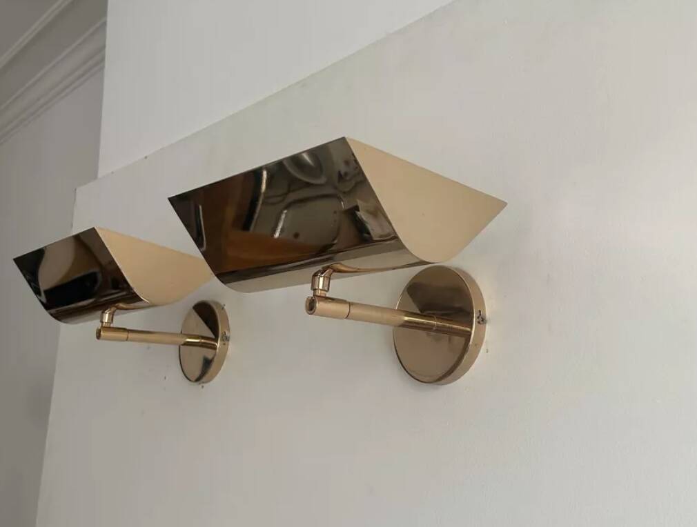 Pair of vintage adjustable solid brass wall lights France 1970