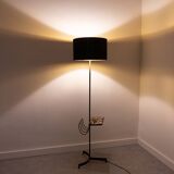 Black metal magazine rack floor lamp with ceramic shelf