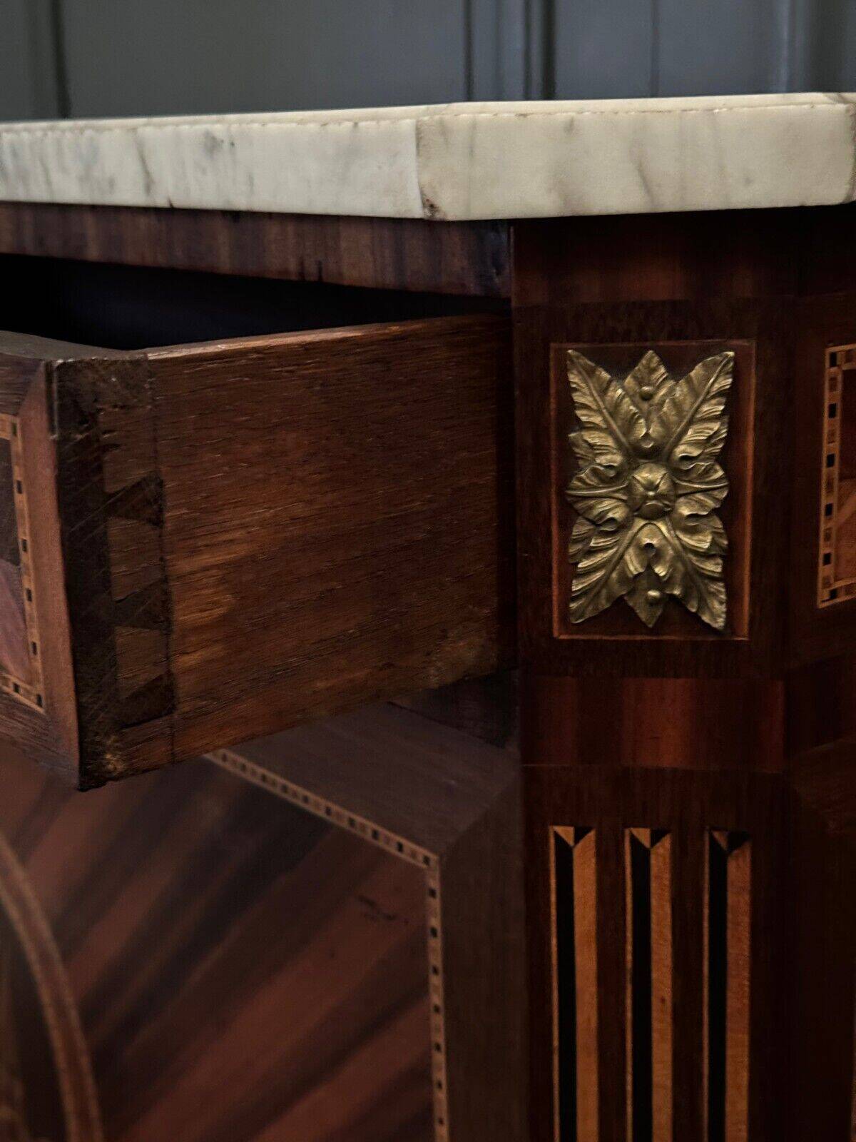 Louis XVI period secretary in monogram marquetry and white marble