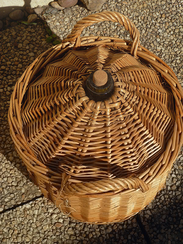 Demijohn covered with wicker