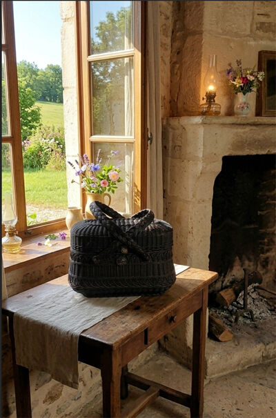 Old Bressan basket in blackened wicker