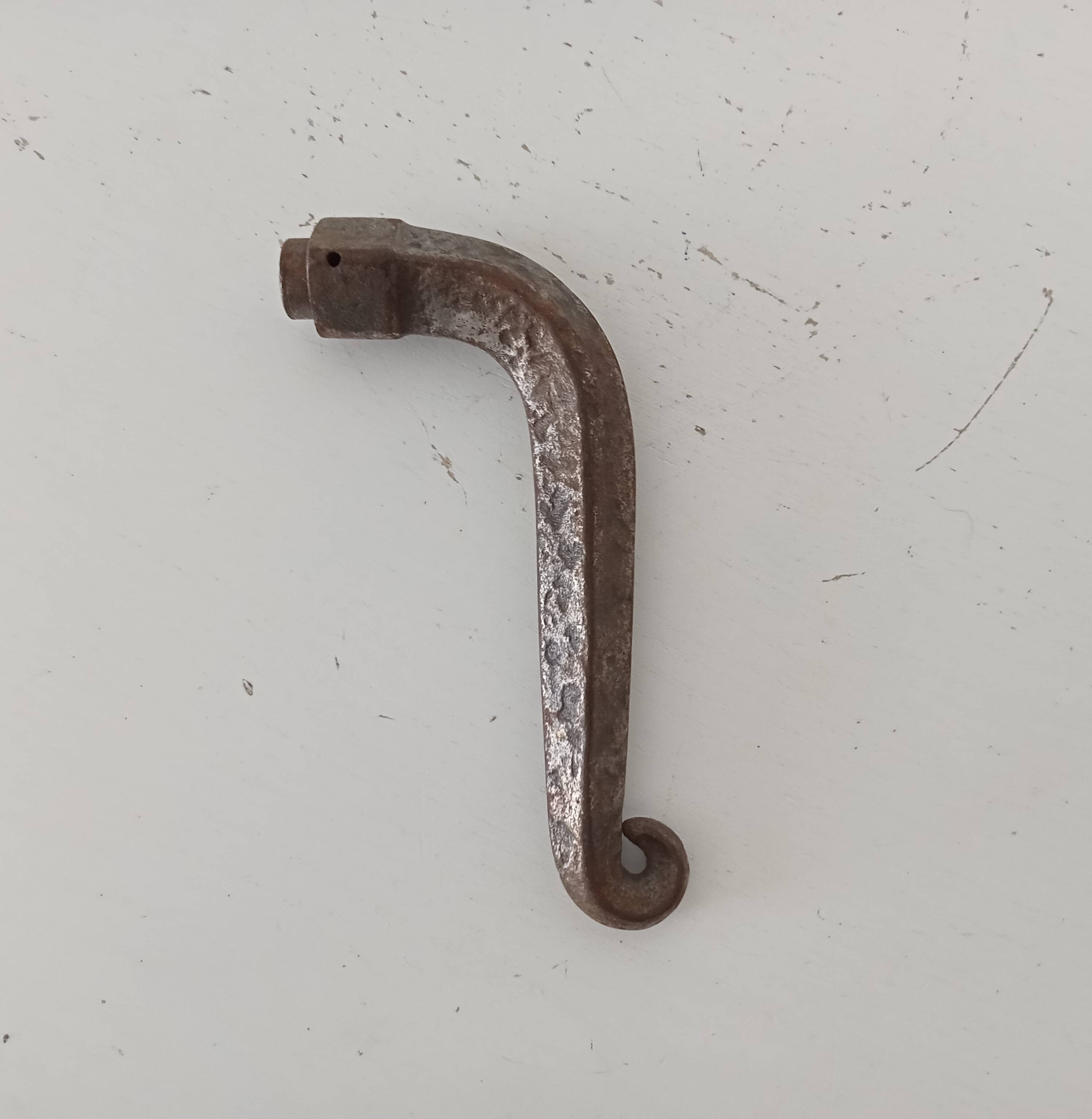 19th-century antique door handle in forged steel