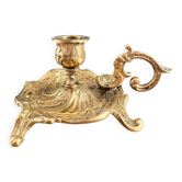Antique hand candlestick in gilded bronze from the 19th century.