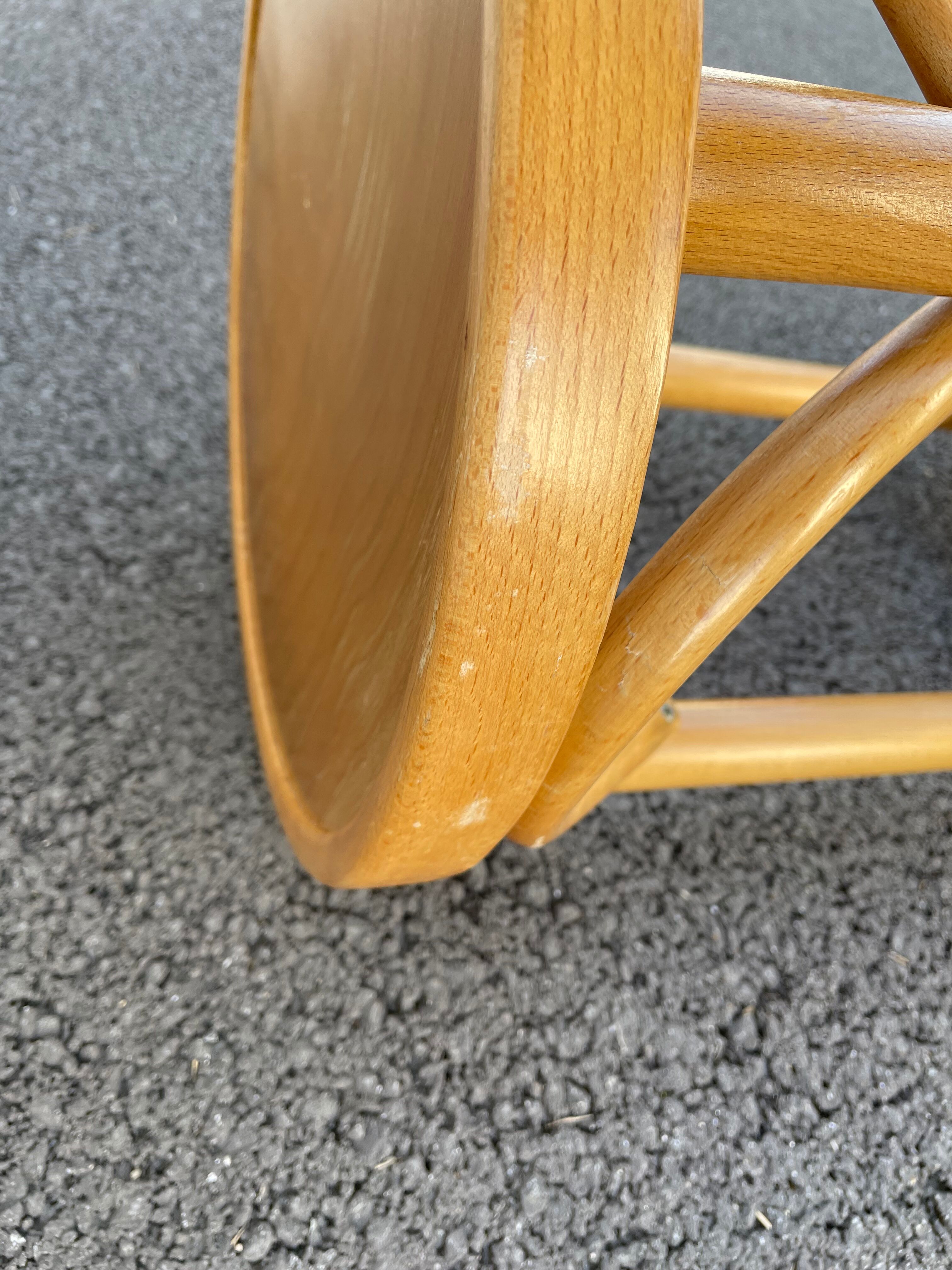 Curved wooden bar stool