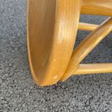 Curved wooden bar stool