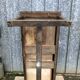 Old chestnut table with 3 front drawers and a cat bar.