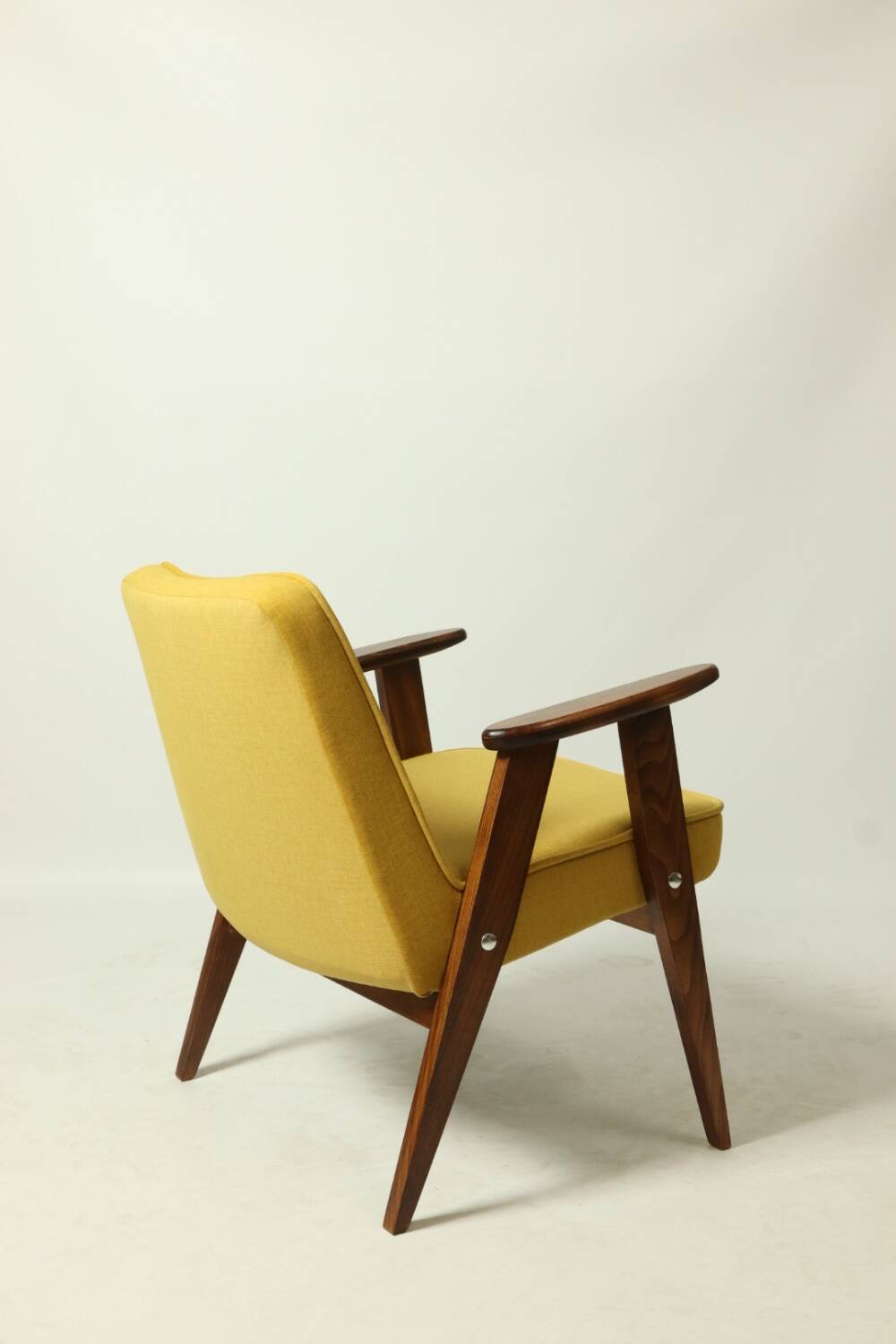 Vintage armchair plush yellow velvet soft dark wood 1962 design by Chierowski