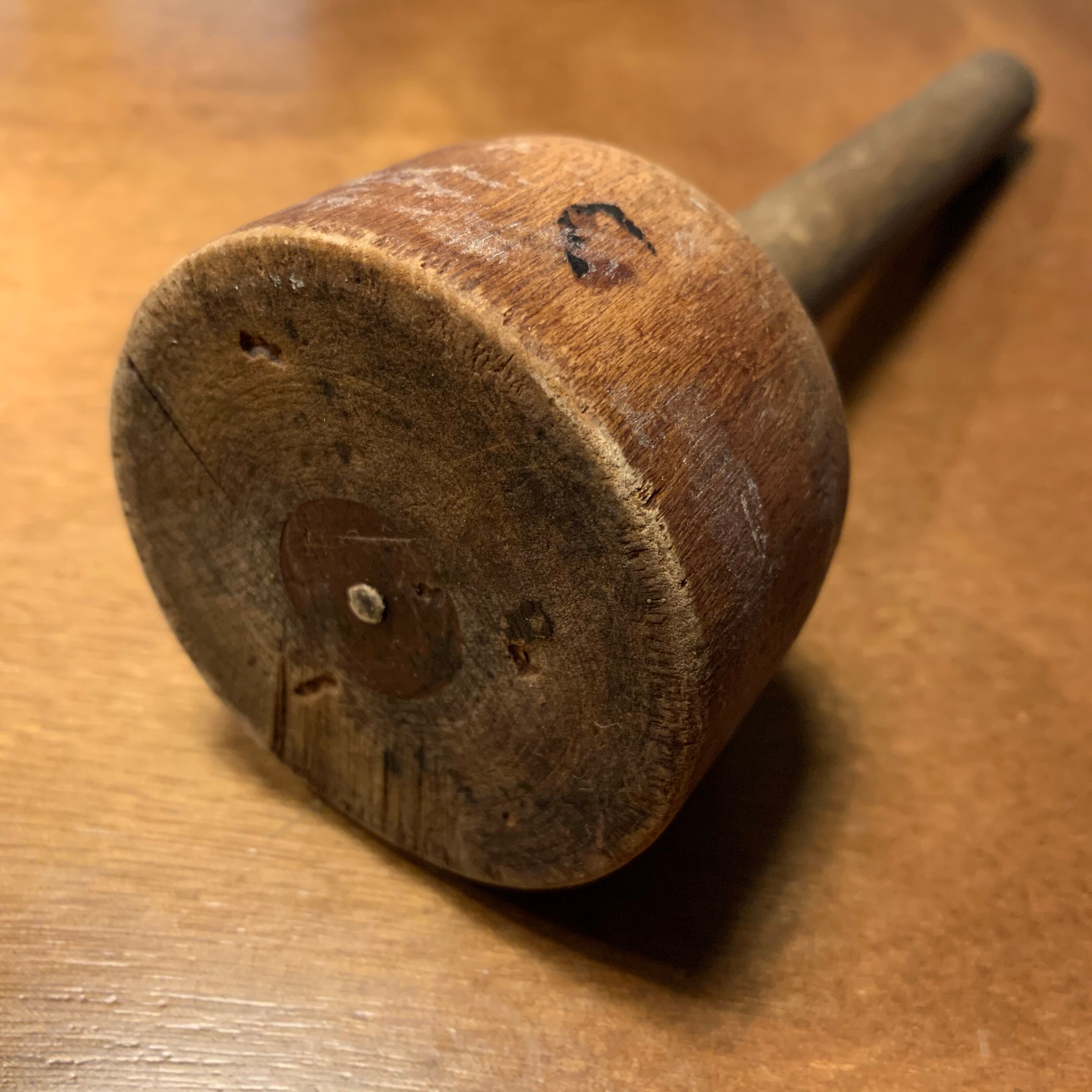 Old wooden pestle