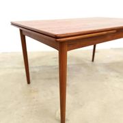Teak dining table with integrated extensions — Scandinavian