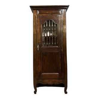 Louis XV period bonnetière in solid oak circa 1750