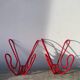 Pair of red metal wall hooks