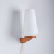 Wall lamp with opal glass shade on wooden base by Philips