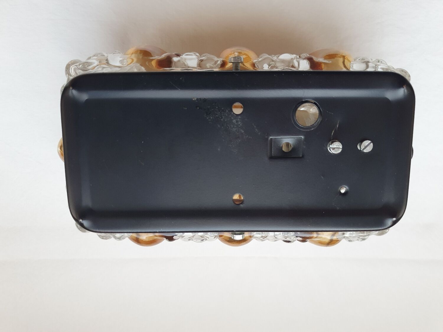 Bubble glass and amber wall light