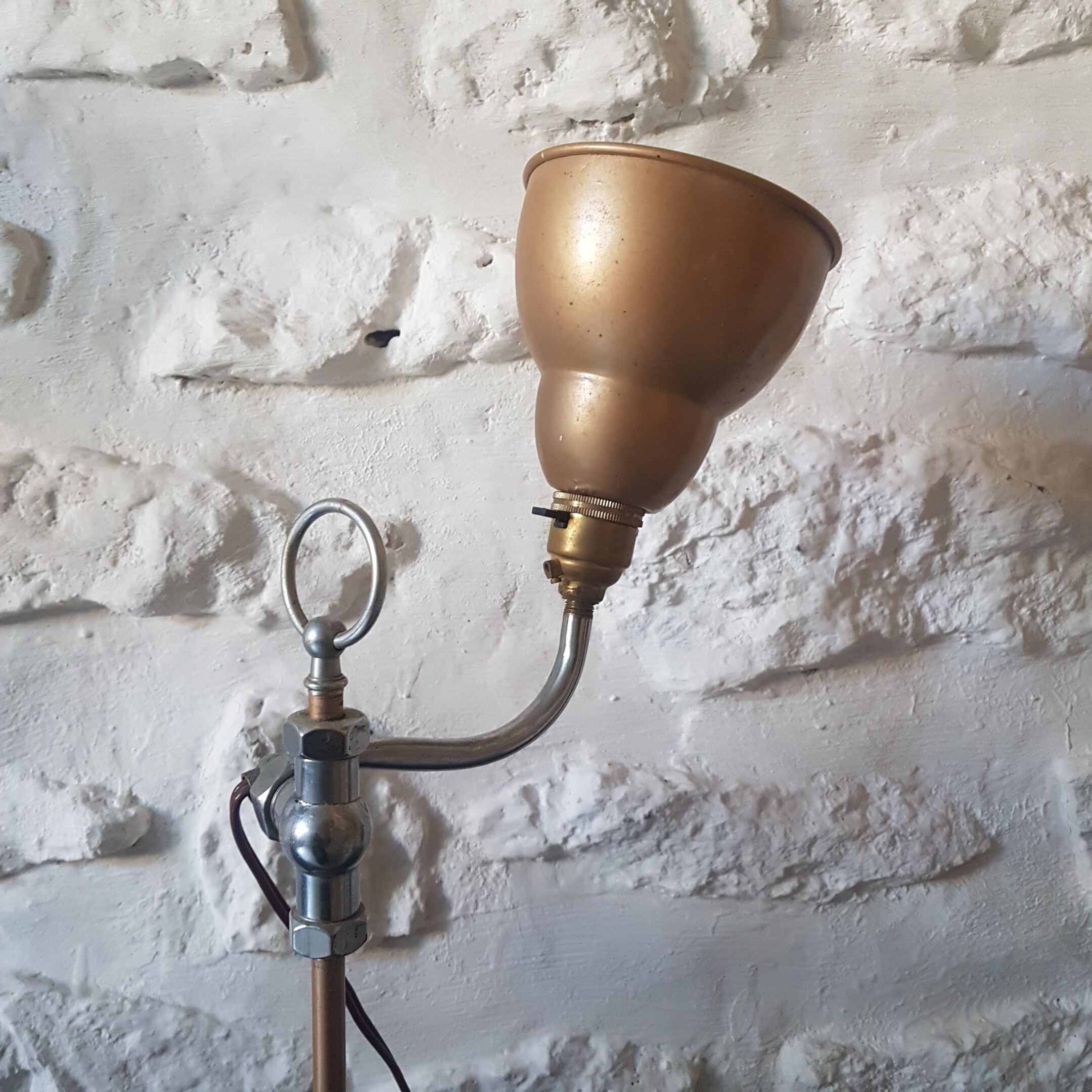 Old patinated articulated lamp