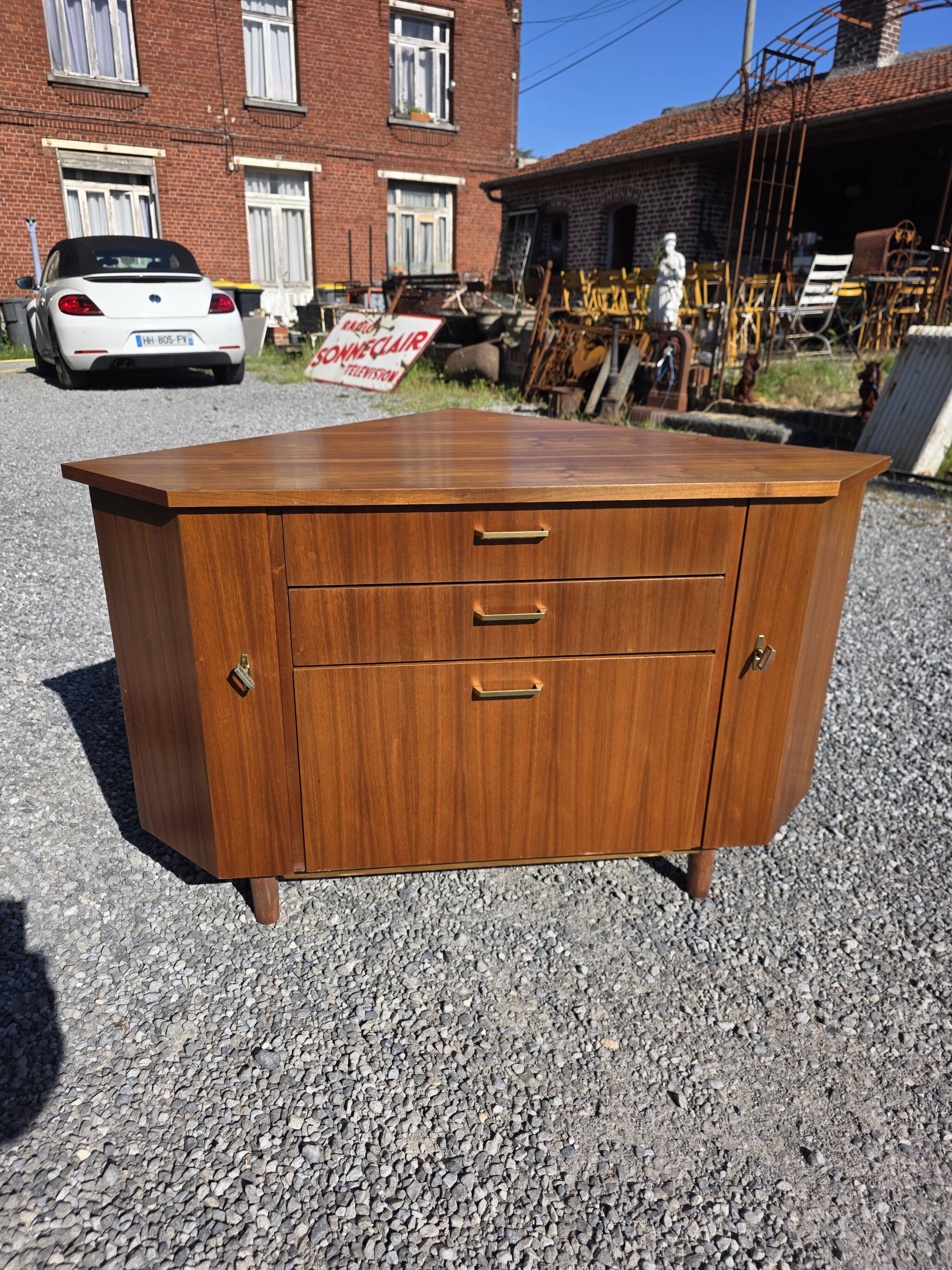 Scandinavian corner unit in teak from the 1960s.