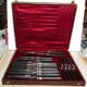 Set of 24 knives & 2 pieces of silver metal service