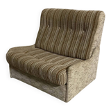 Vintage convertible armchair into a guest bed.