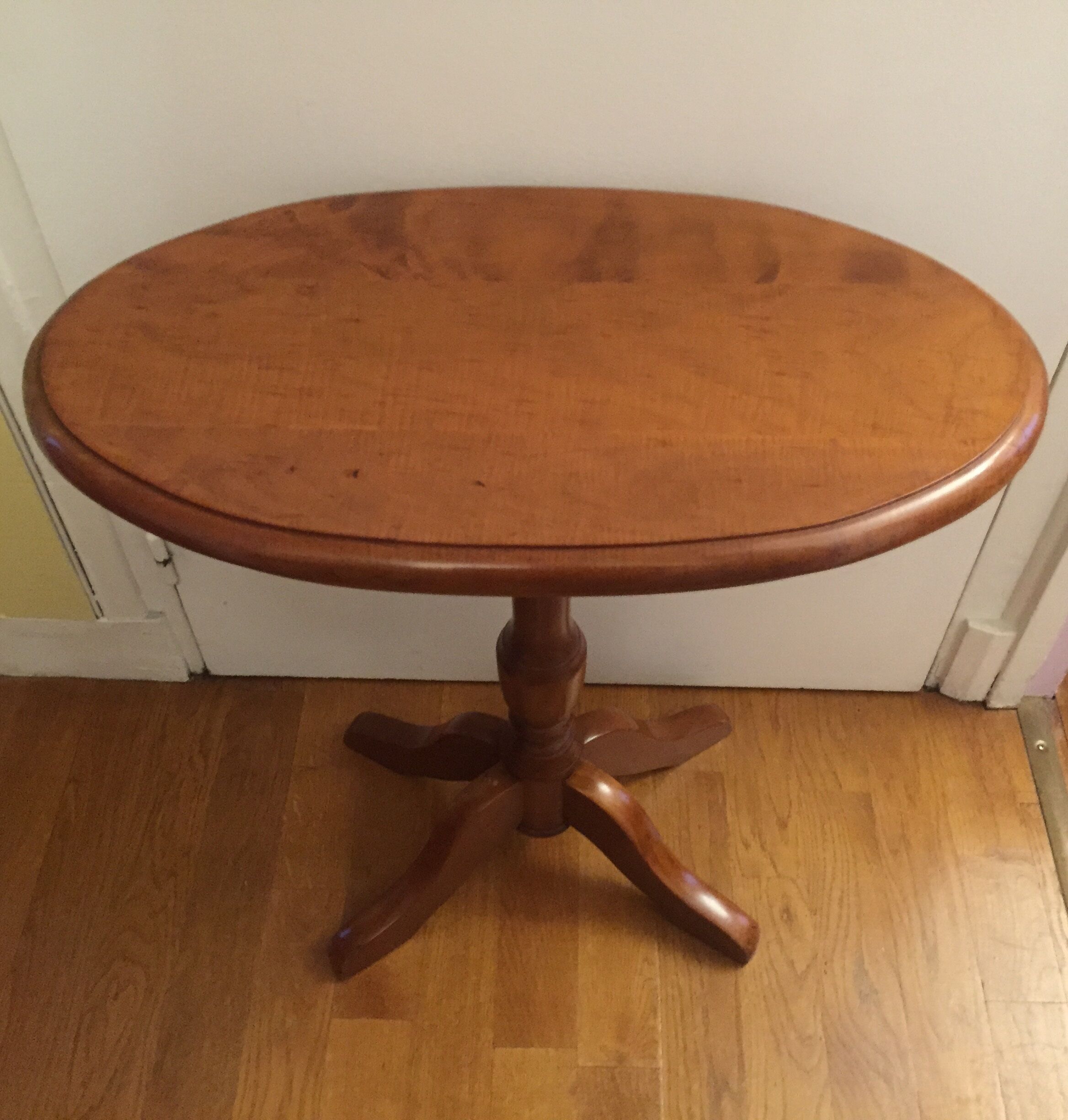 Oval pedestal table