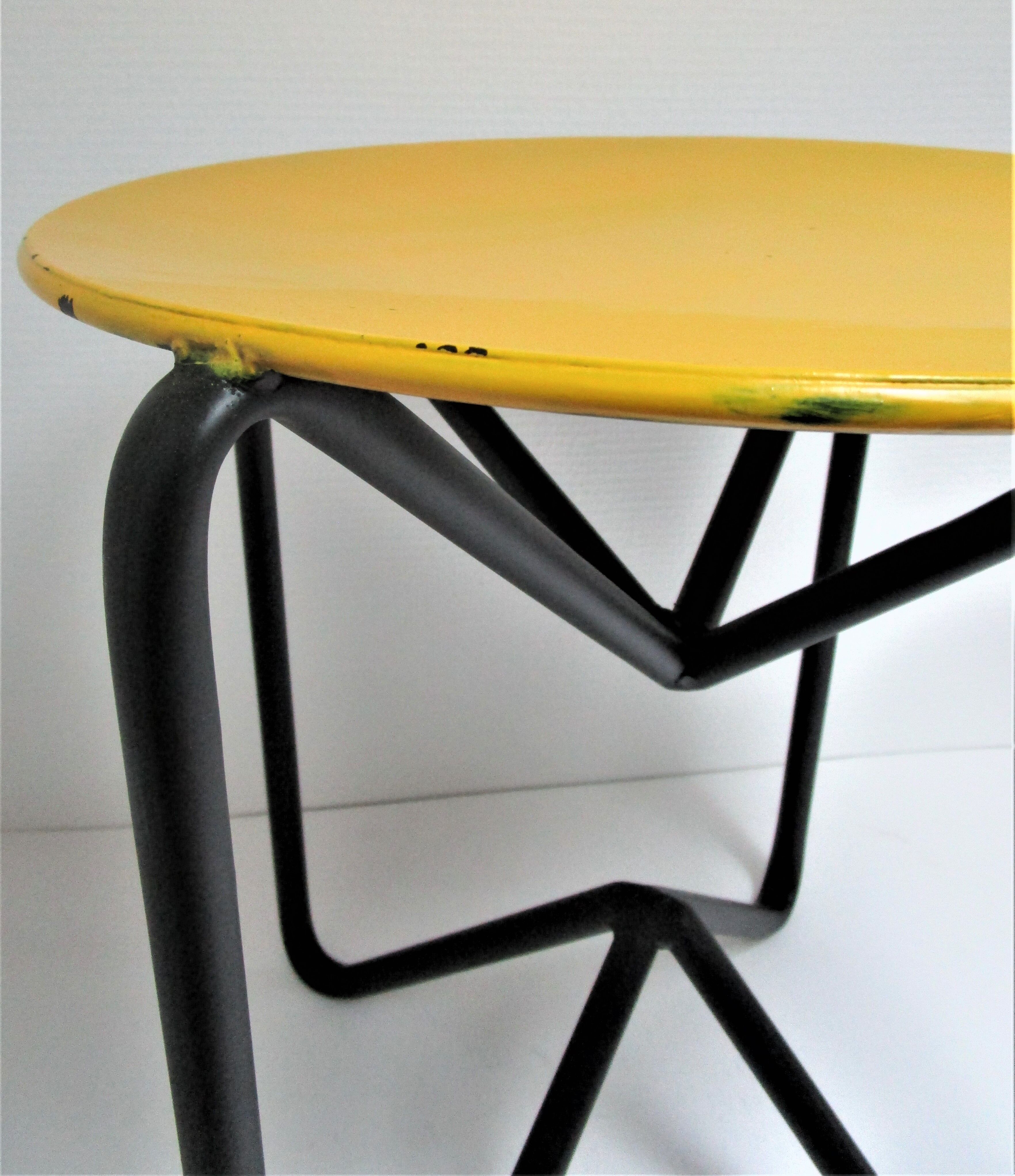 Yellow and black metal stool design 90s