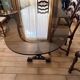 Large antique dining table in wrought iron and smoked glass,