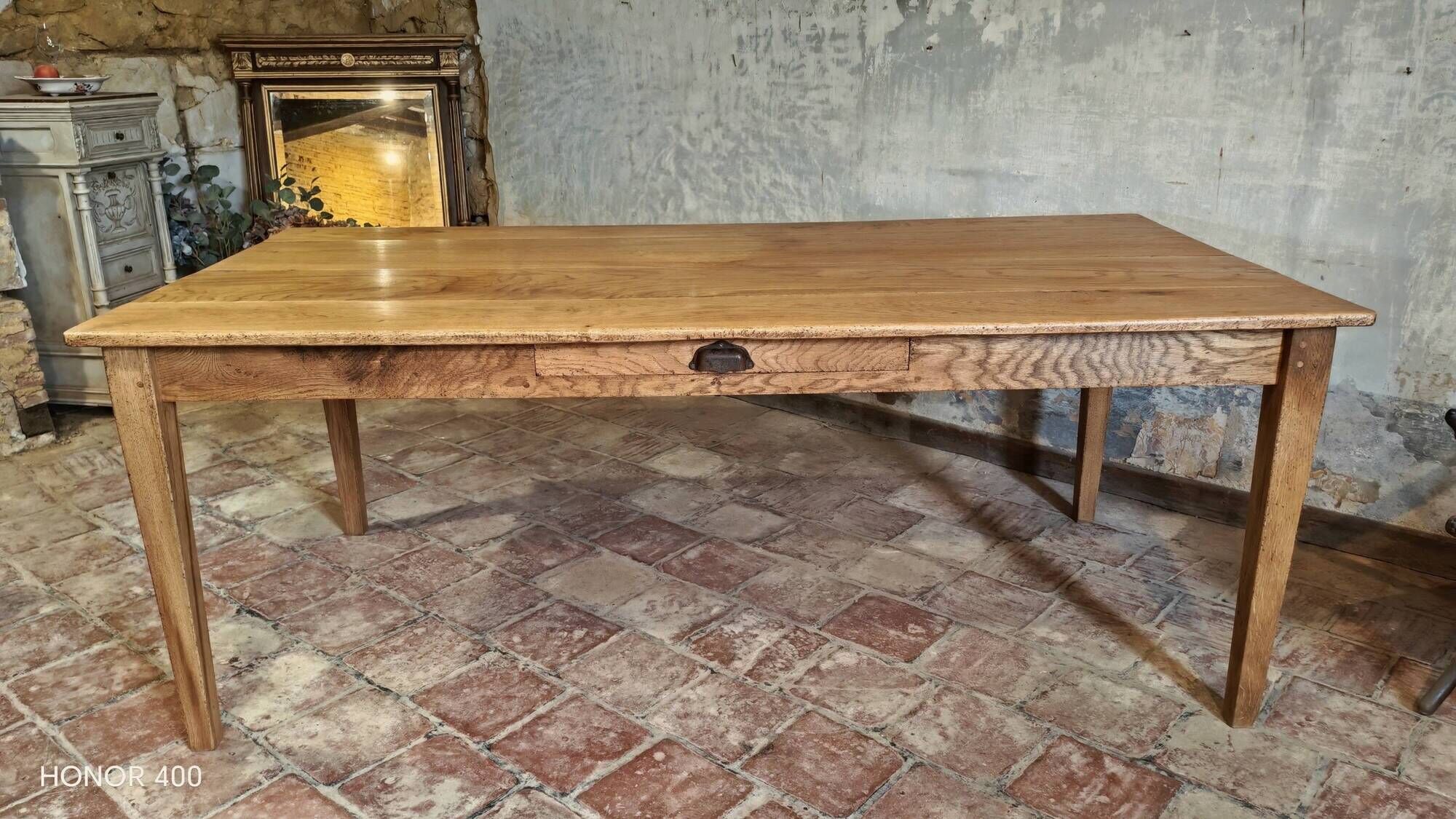 Large authentic farmhouse table made of solid French oak.