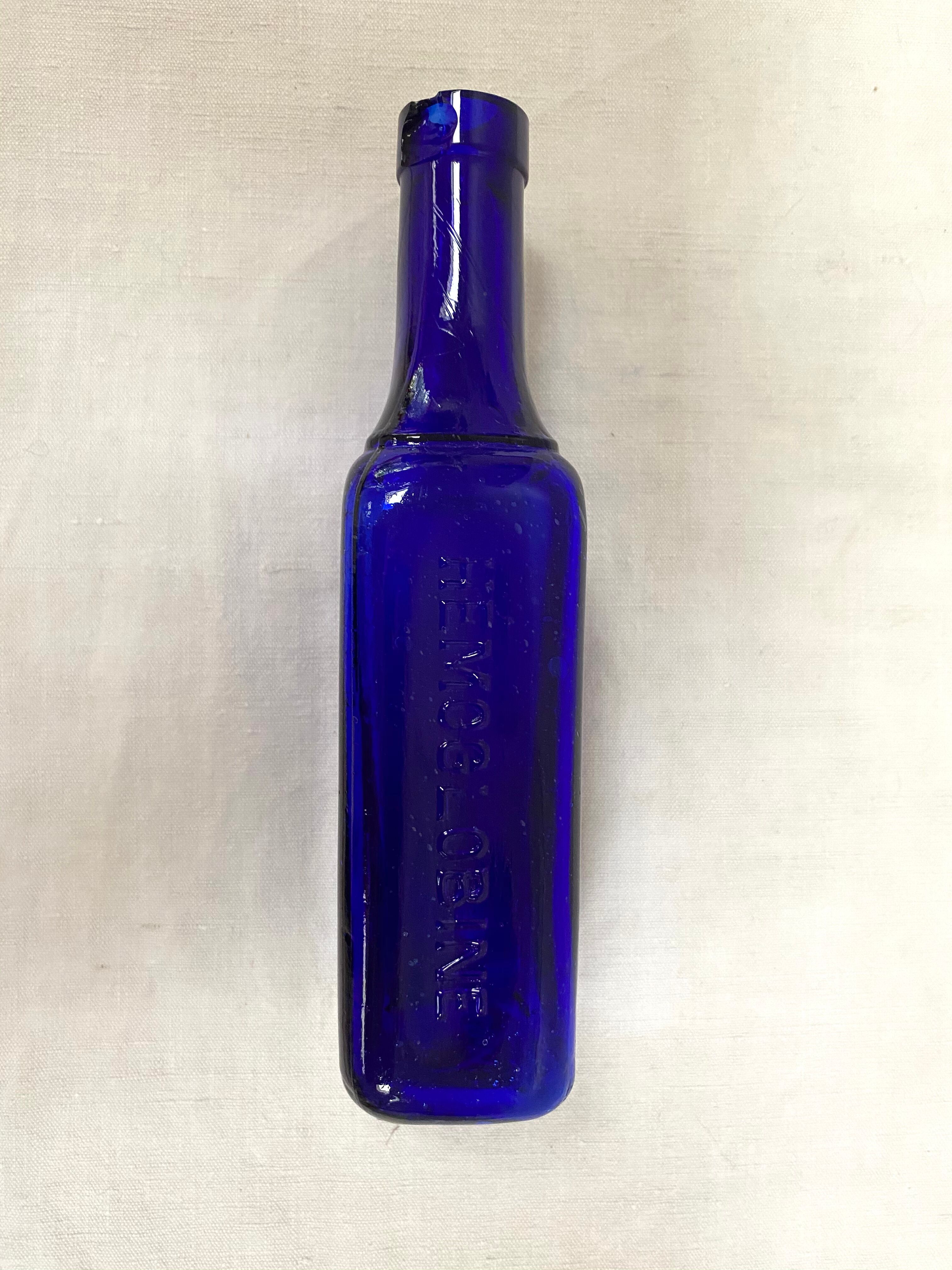 Set of 6 cobalt blue glass pharmacy bottles