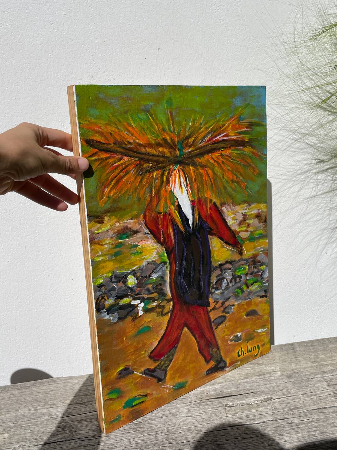 Painting of a woman in a field signed Lung