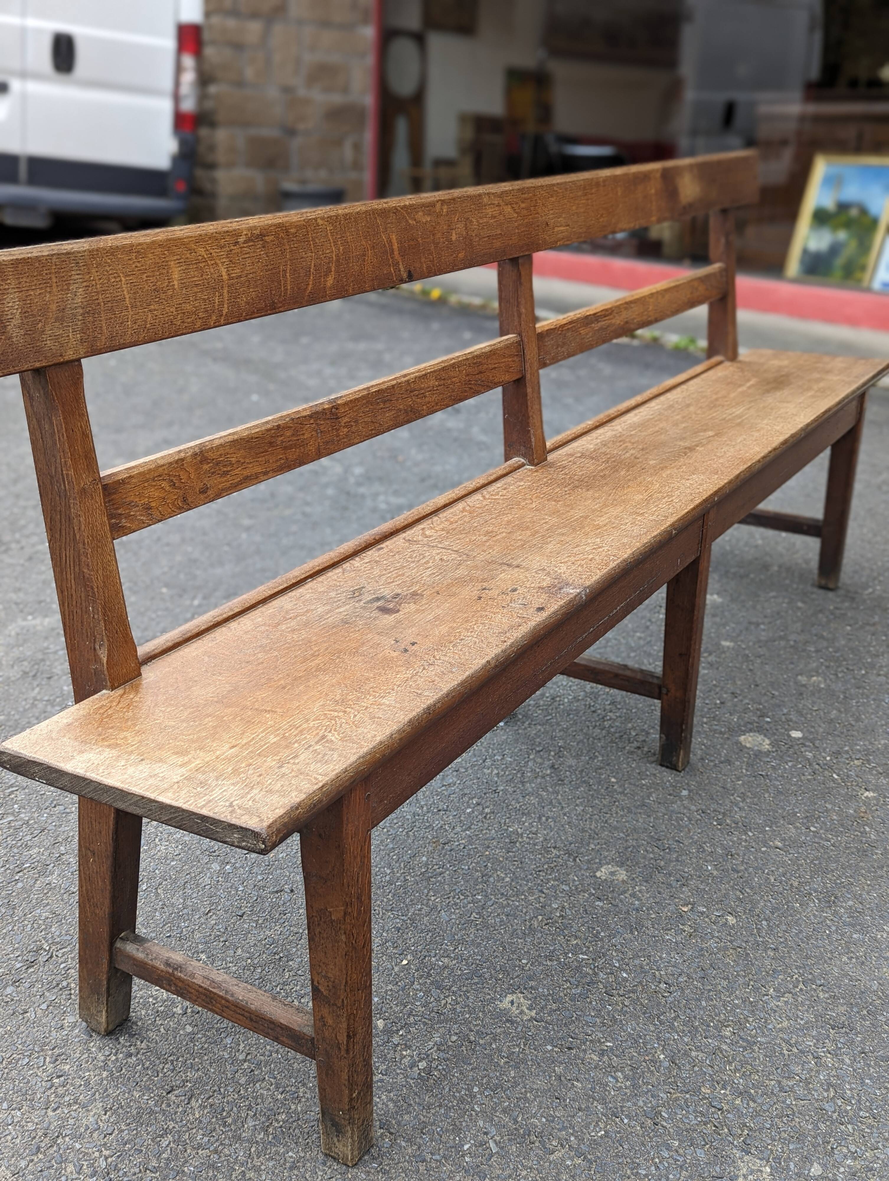 Large oak bench with back