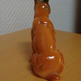 Chien boxer en porcelaine