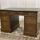 Late 19th century English mahogany desk with pedestals and leather top