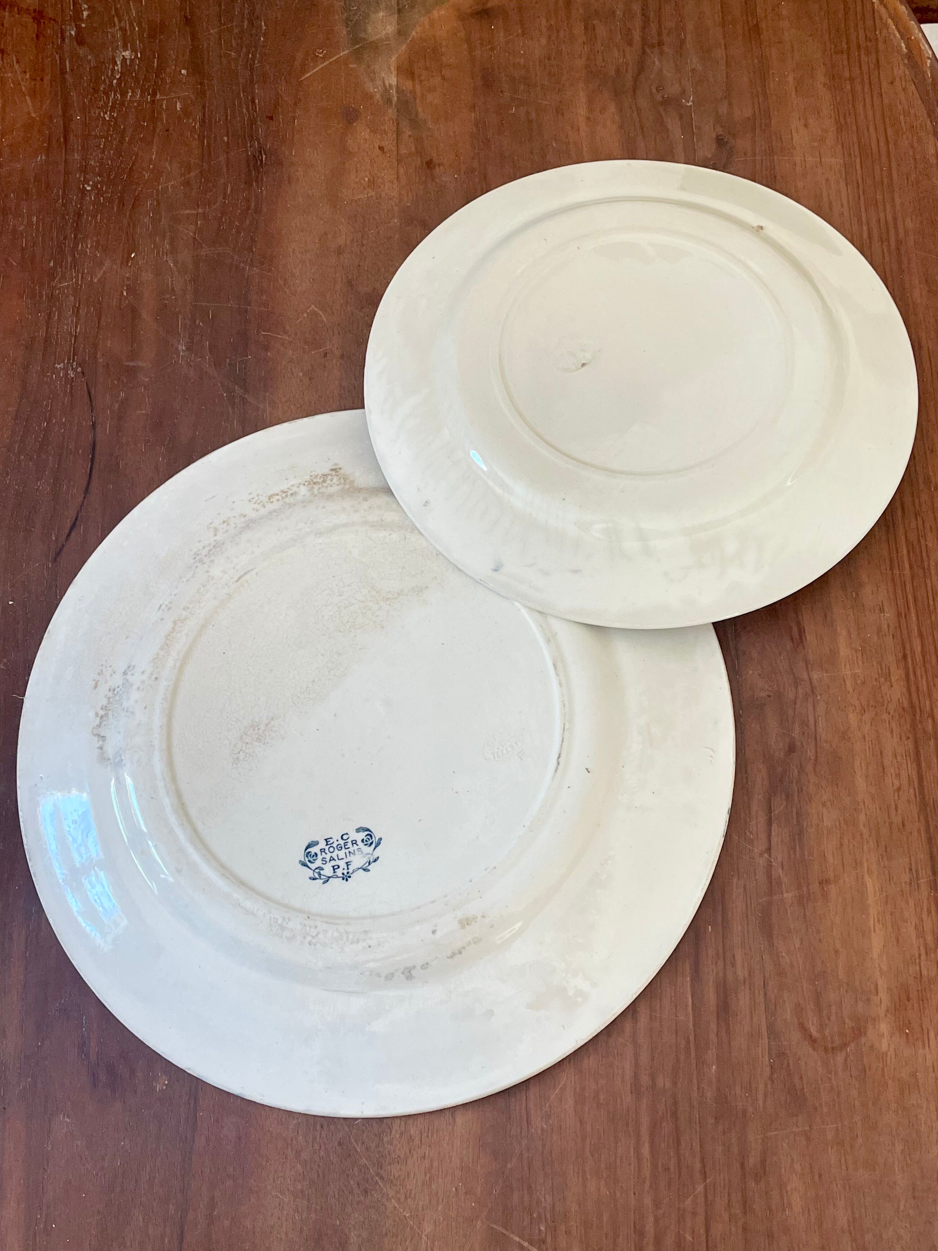 Two round dishes Terre de Fer Salins E.C Model "Roger"