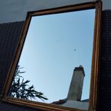 Miroir en bois, doré à la feuille d'or.