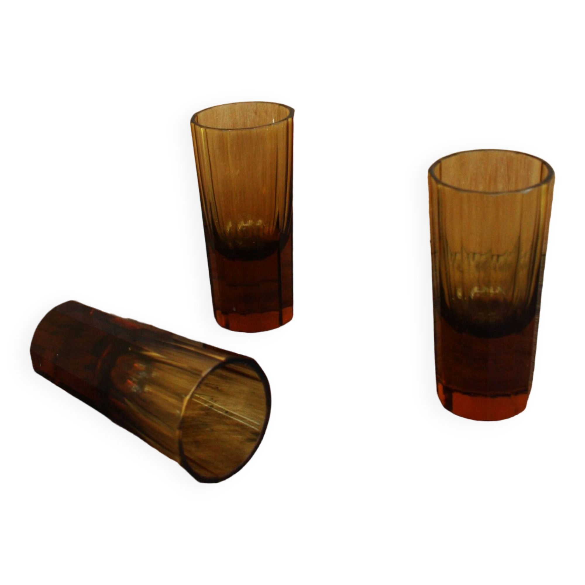 Three vintage shot glasses