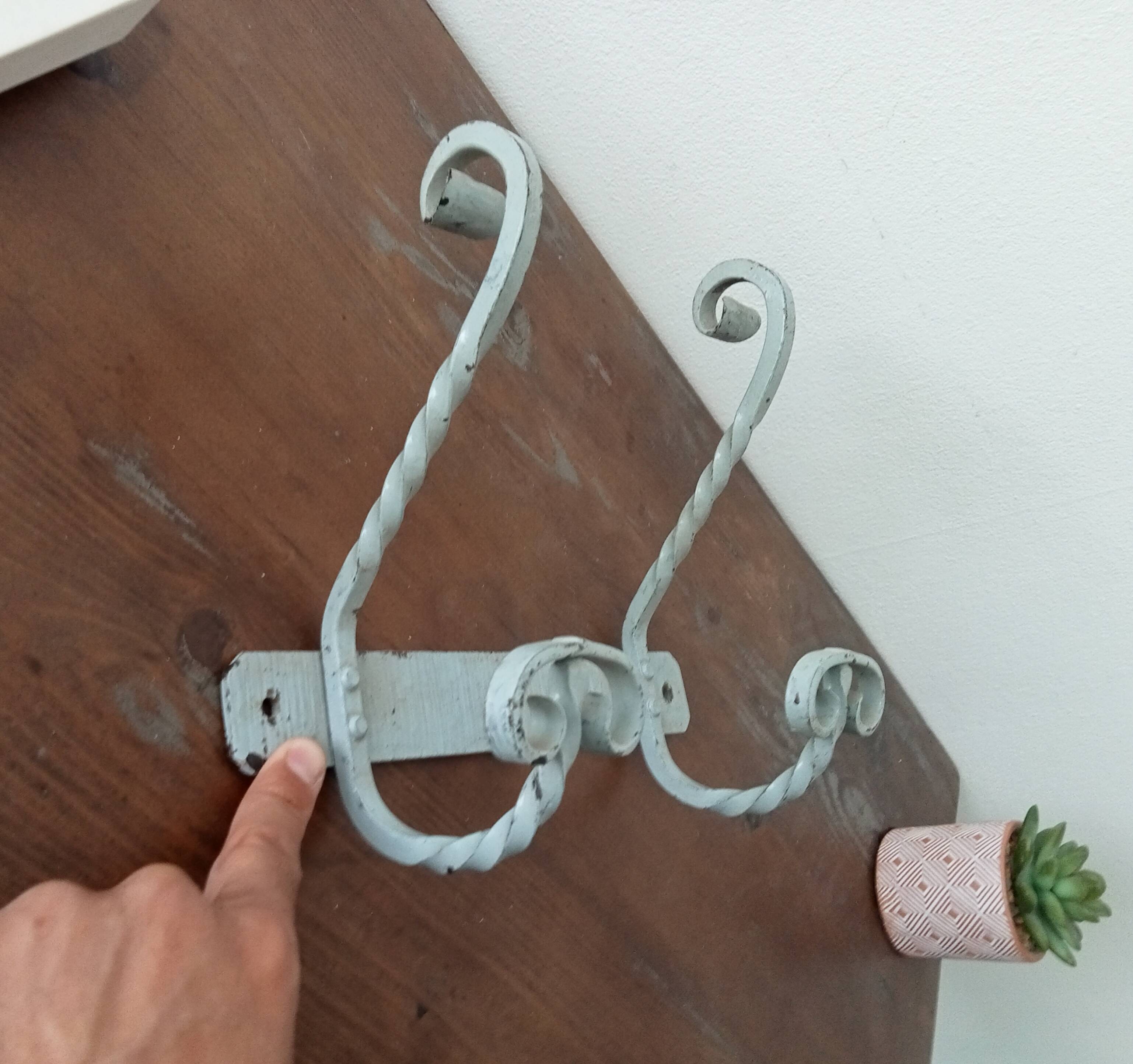 Vintage wrought iron wall coat rack