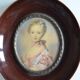 Miniature portrait of a young girl, framed and under glass