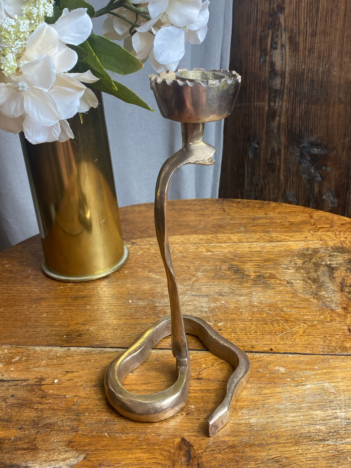 Cobra candlestick in brass