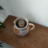 Stoneware pitcher with ice cube compartment