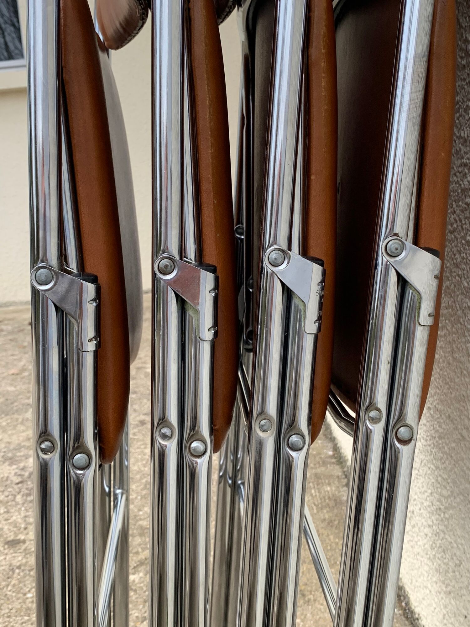 4 folding chairs chromed metal and Skaï fawn 1970